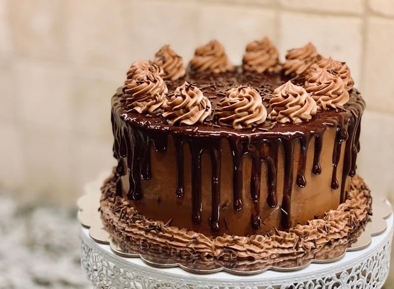 A chocolate cake with swirled icing